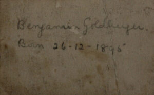 Father's details behind photograph